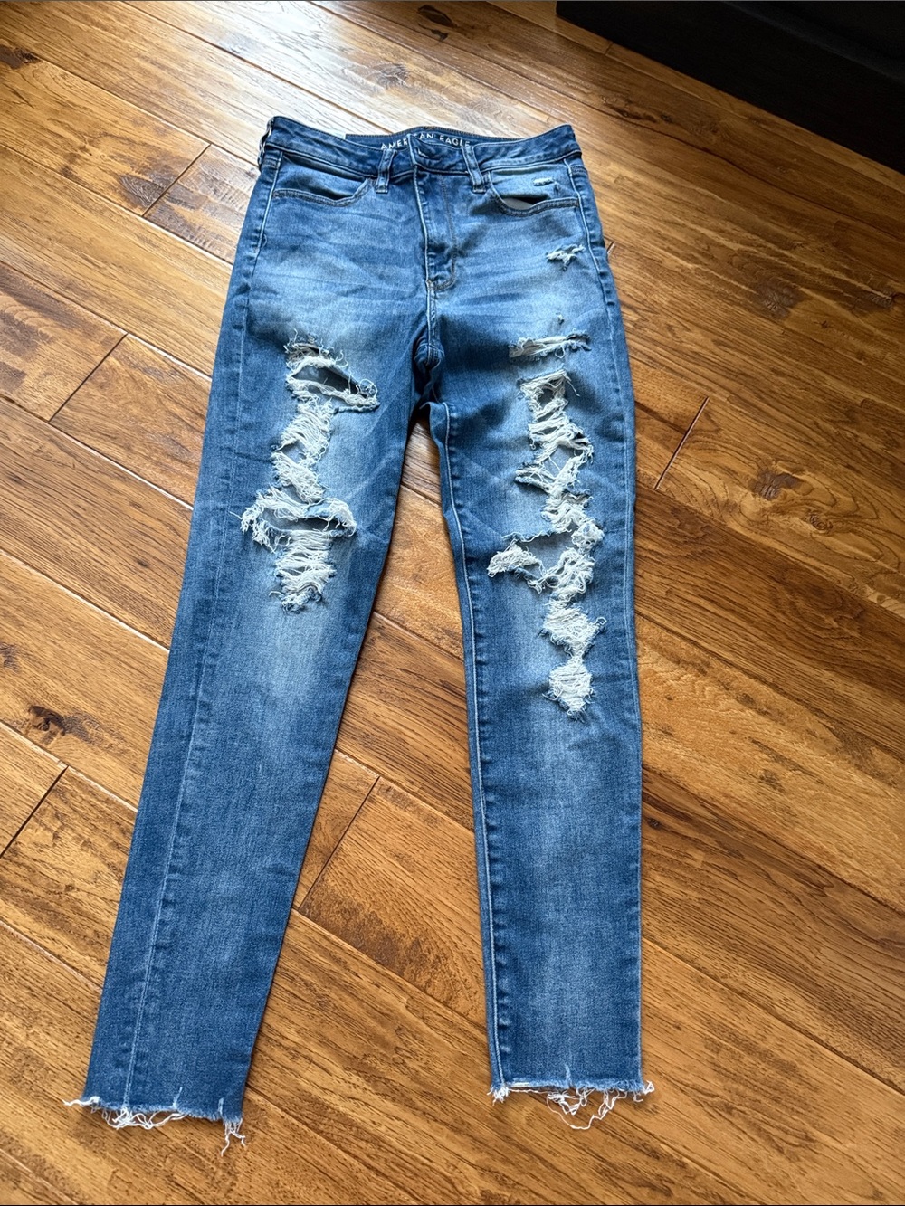 American Eagle Outfitters Blue Ripped Super Hi-Rise Jegging